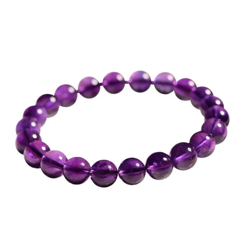 Natural amethyst scattered bead bracelet made from polished Uruguayan crystal in various sizes.