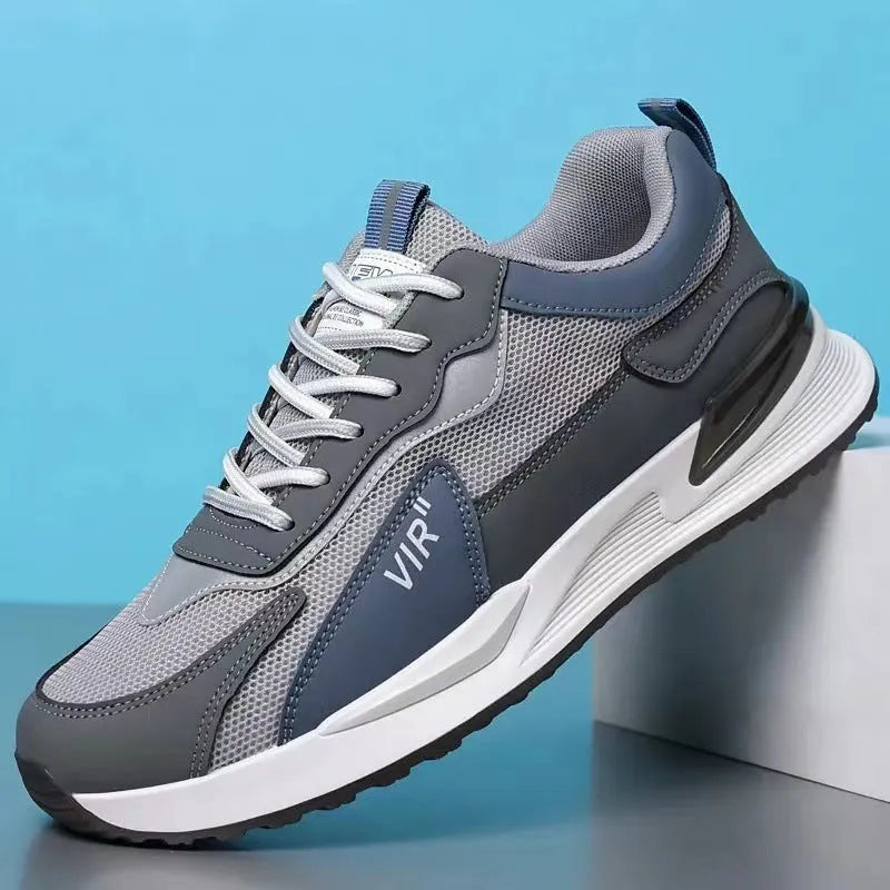 Men's low-top lace-up sneakers with colour block mesh upper and injection moulded sole.