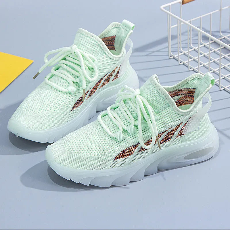 Women's cowhide sports casual shoes in white with a round toe and flat plastic sole.