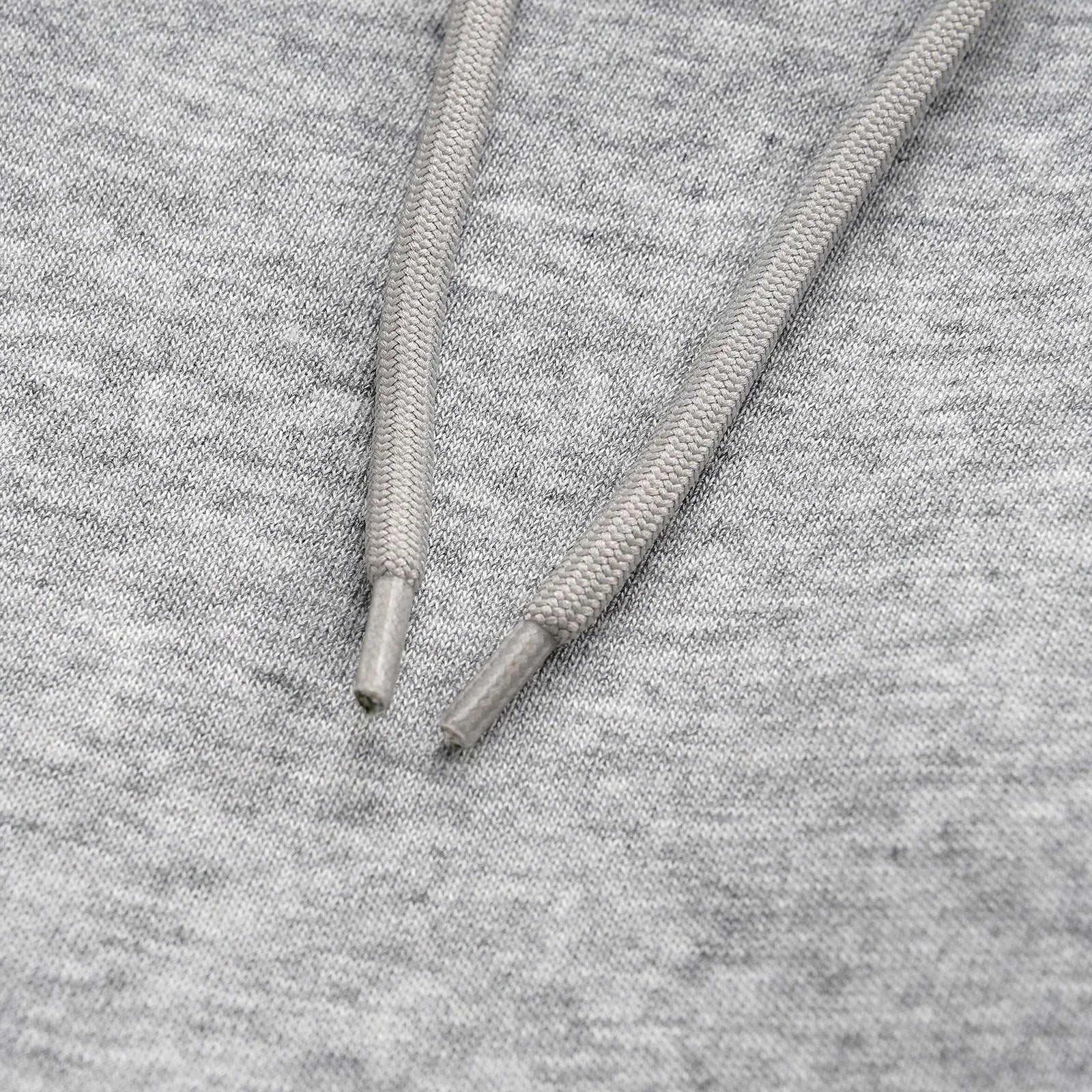 Men's grey cotton straight-leg loose fit trousers with an elasticated waistband on a neutral background.