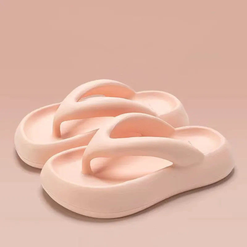 Solid colour EVA flip-flops with thick sole and decorative bow.