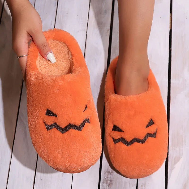 Orange Halloween pumpkin slippers with plush lining and non-slip PVC soles