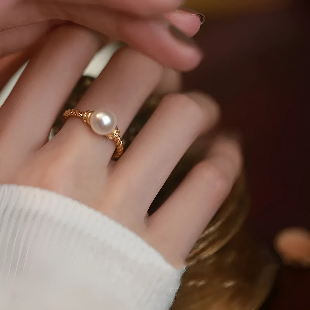 Antique twist pearl ring with adjustable copper band in geometric design with pearl inlay