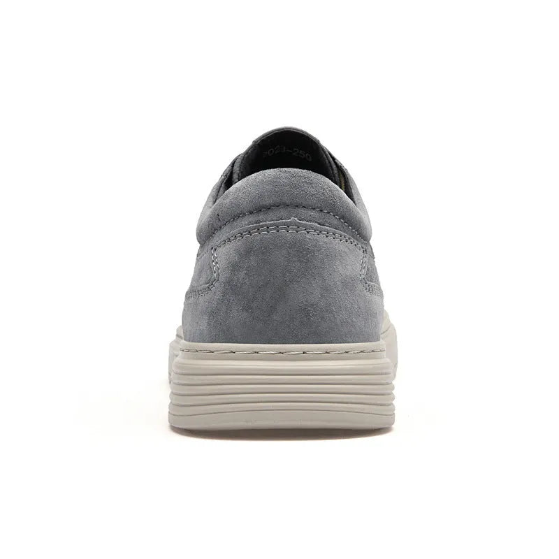 Men's grey casual leather skate shoes with round toe and lace-up front.