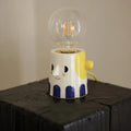 Handmade ceramic bedside lamp with ball headlight decorative design