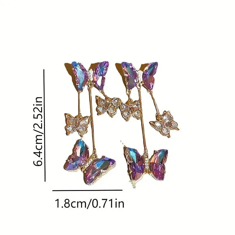 Blue purple alloy drop earrings with crystal flowers, butterfly design and tassel detailing