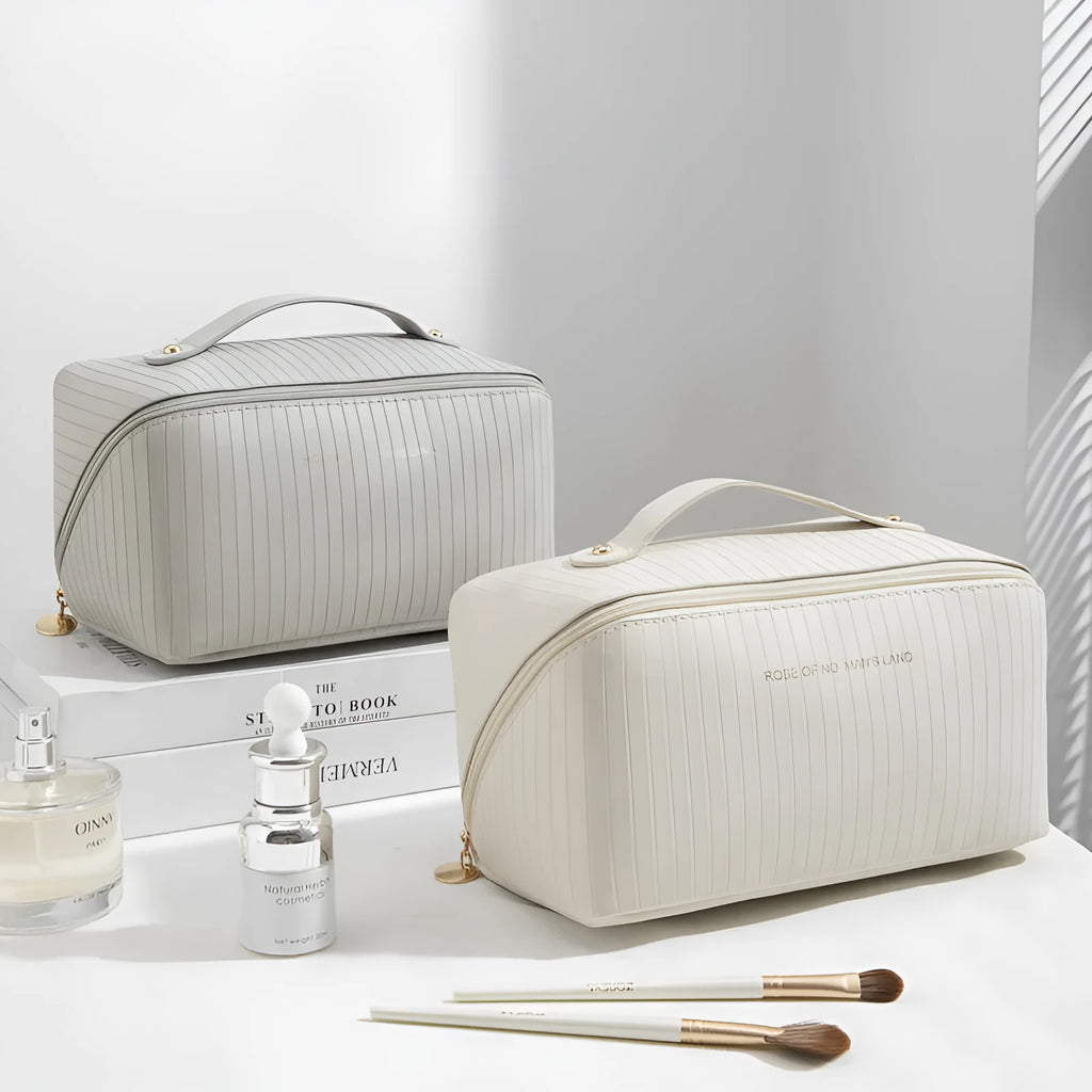 Cubic PU makeup bag with vertical pattern pillow design measuring 22.5cm