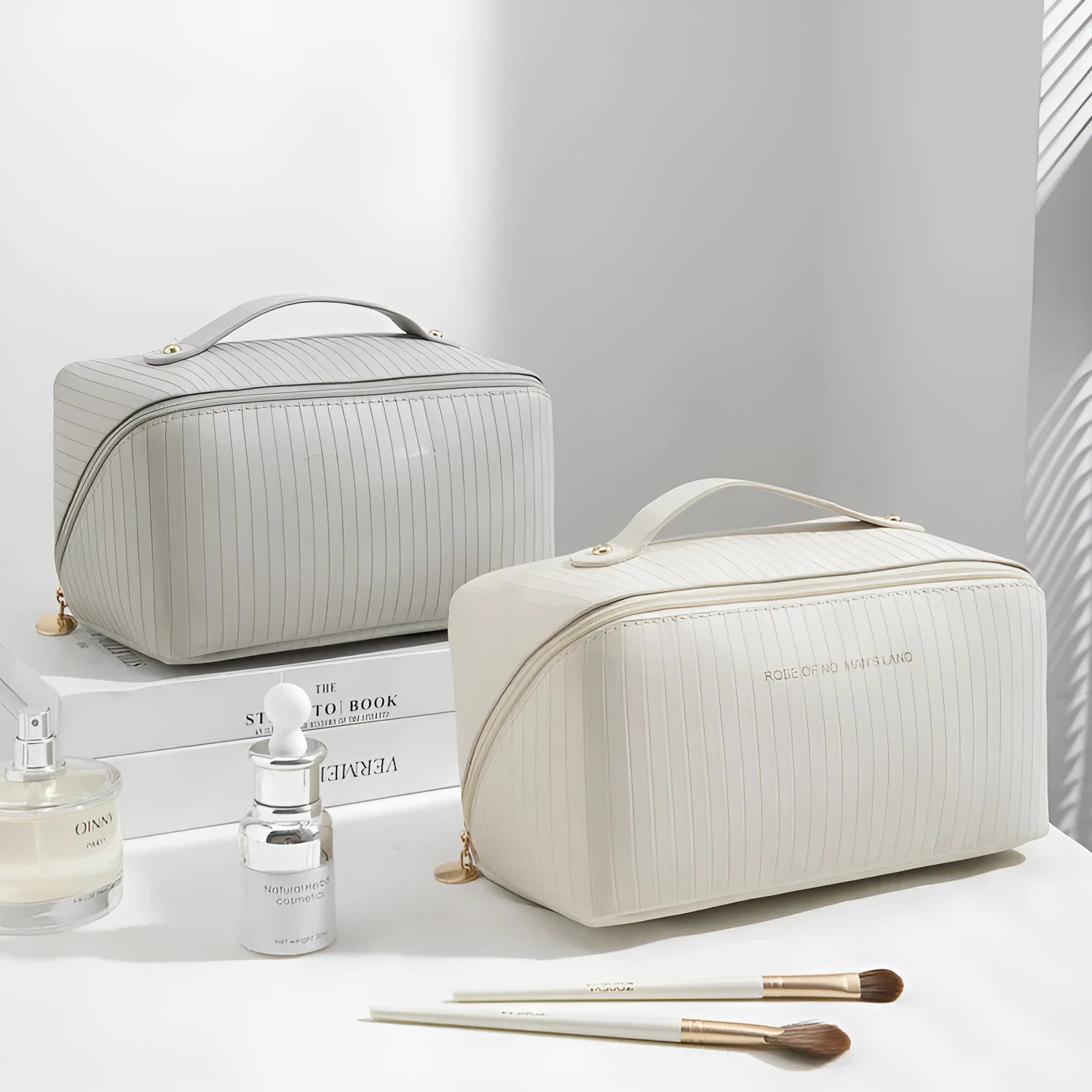 Cubic PU makeup bag with vertical pattern pillow design measuring 22.5cm