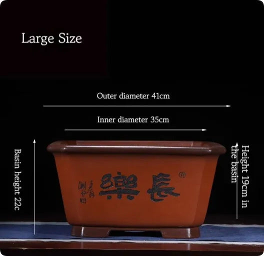 Large purple clay Chinese style flower pot for indoor bonsai or plants.