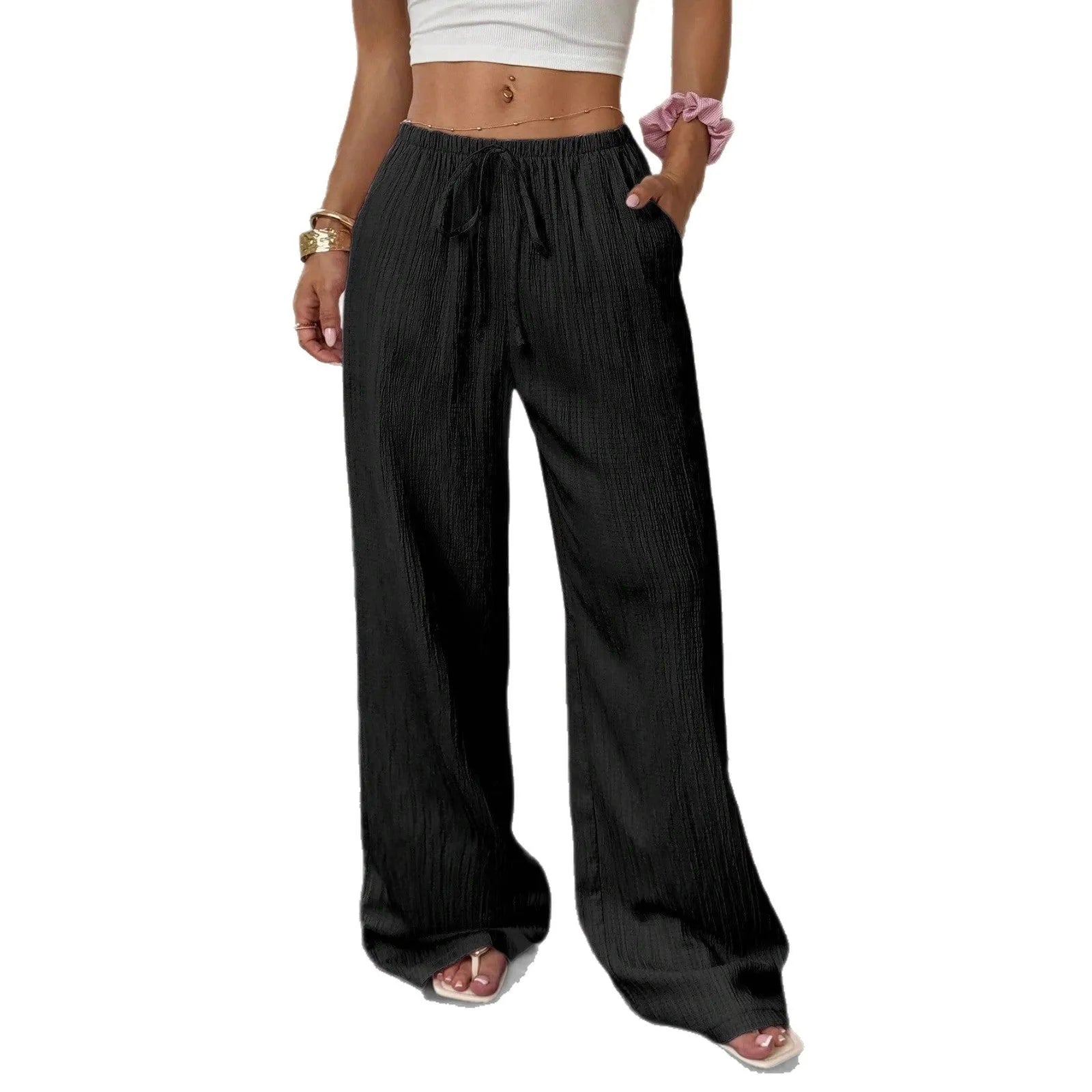 Women's wide leg casual trousers with lace-up waist detail in black and pink.