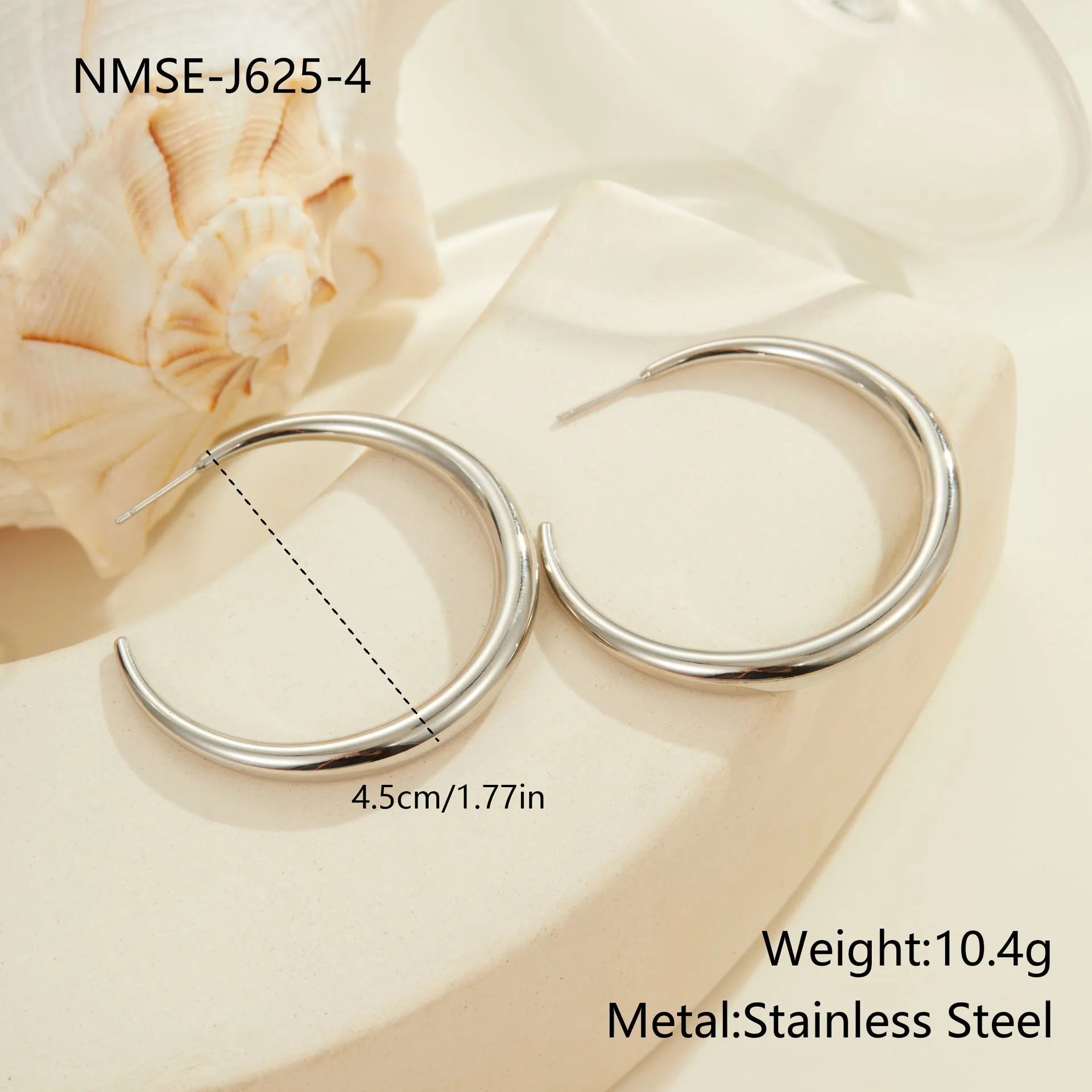Geometric round hoop earrings in titanium steel with 18K gold plating, available in small and large sizes
