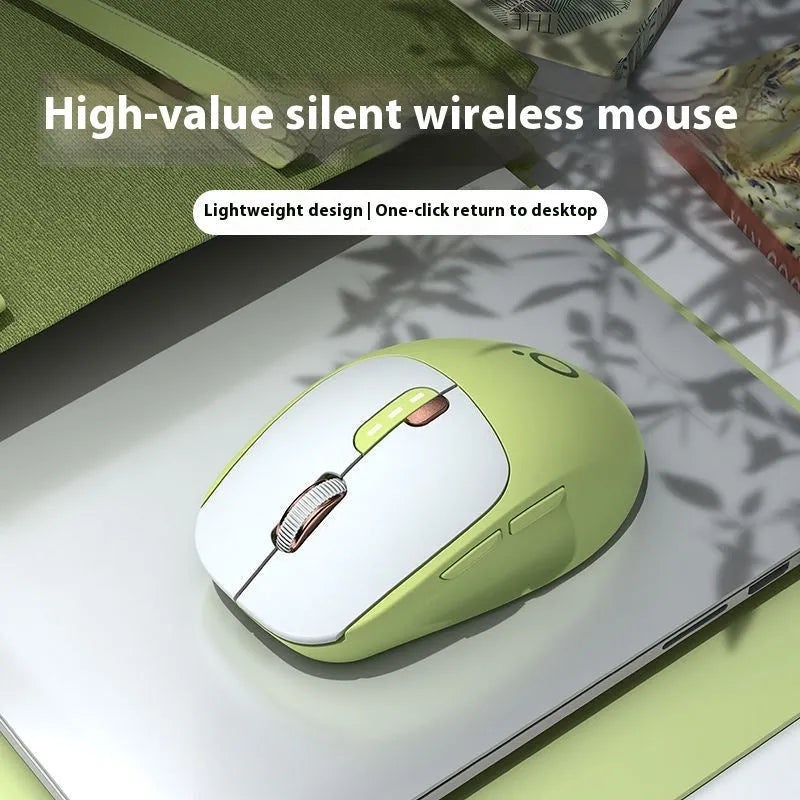 Mute wireless Bluetooth computer mouse in Matcha Green colour on a desk