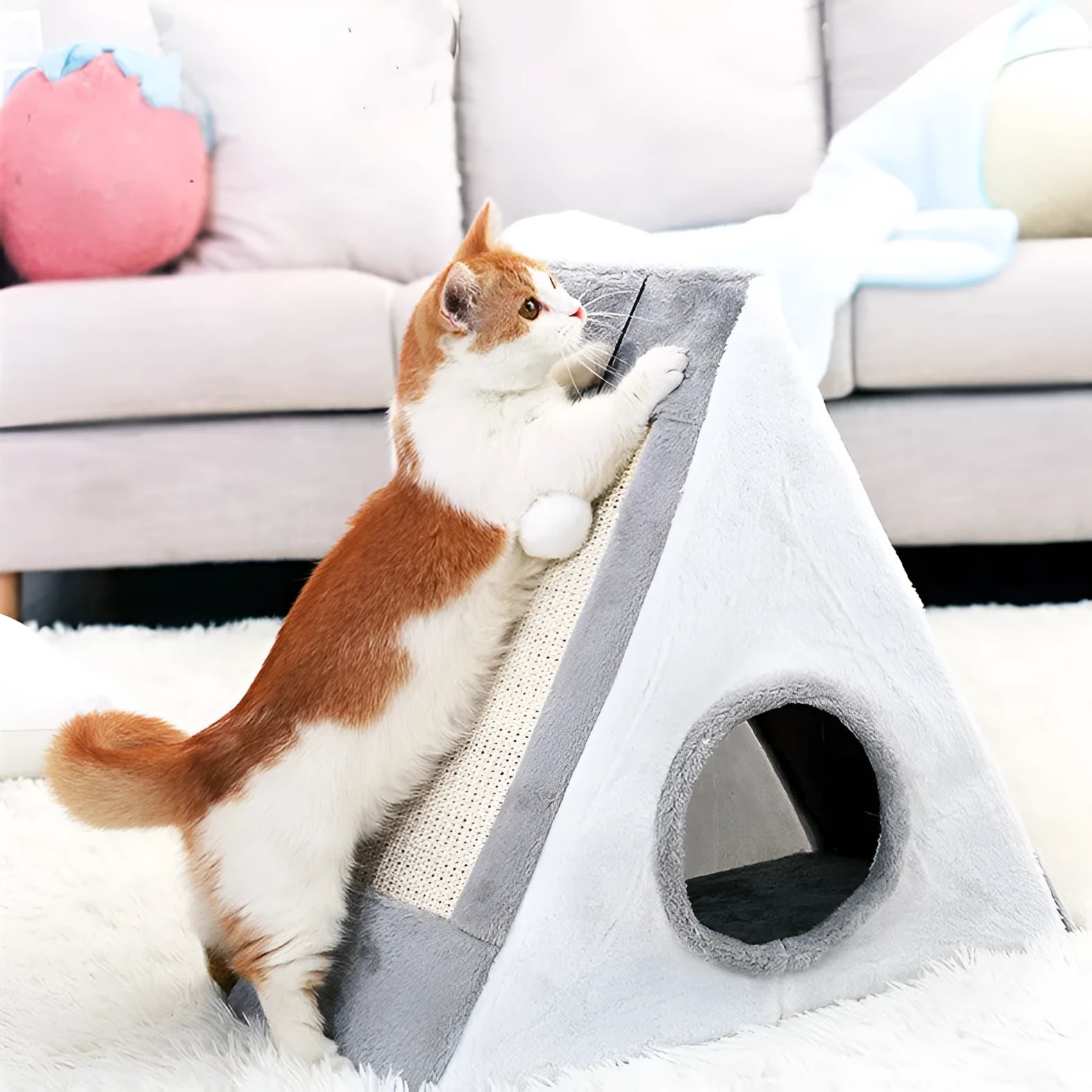Triangular cat bed with fur covering in gray white or light brown beige colors featuring a scratching surface