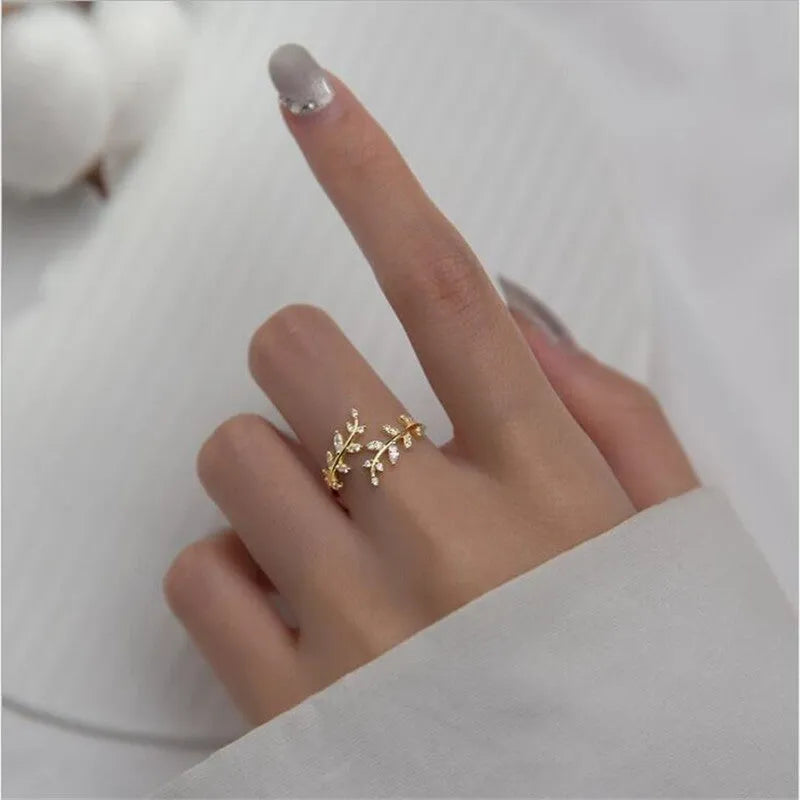 Copper branch ring with geometric leaf design in silver and gold electroplated colours
