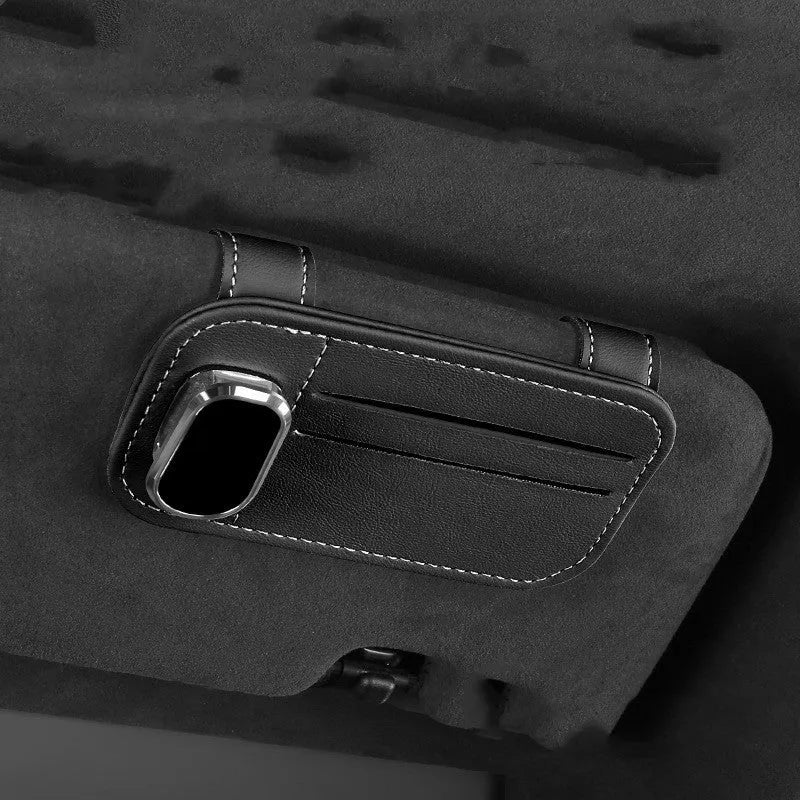 Cowhide leather car sun visor holder with card slots and integrated sunglasses clip.