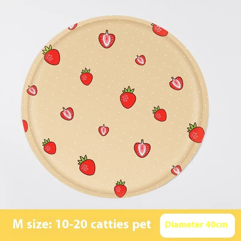 Round cartoon-themed dog cooling mat on a floor, showing gel-filled design and soft cloth cover.