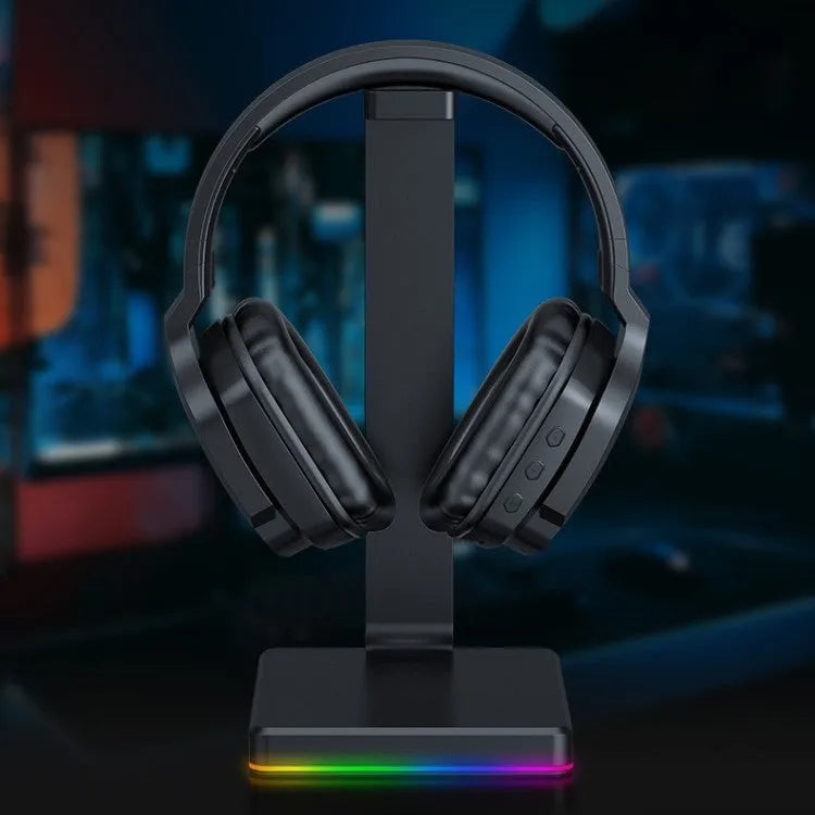Luminous black wireless gaming headphones with head-mounted design showing NFC connectivity symbol