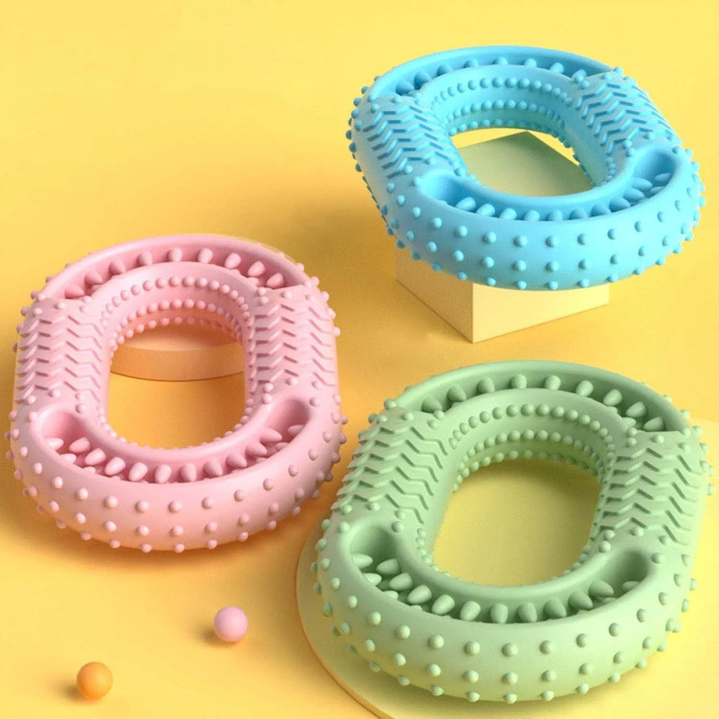Blue durable rubber O-ring dog chew toy with dental cleaning ridges for aggressive chewers
