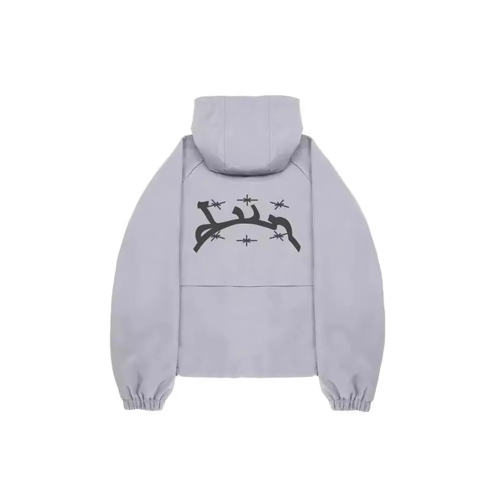 Men's grey hooded sunscreen jacket showing loose British style fit and polyester fabric construction