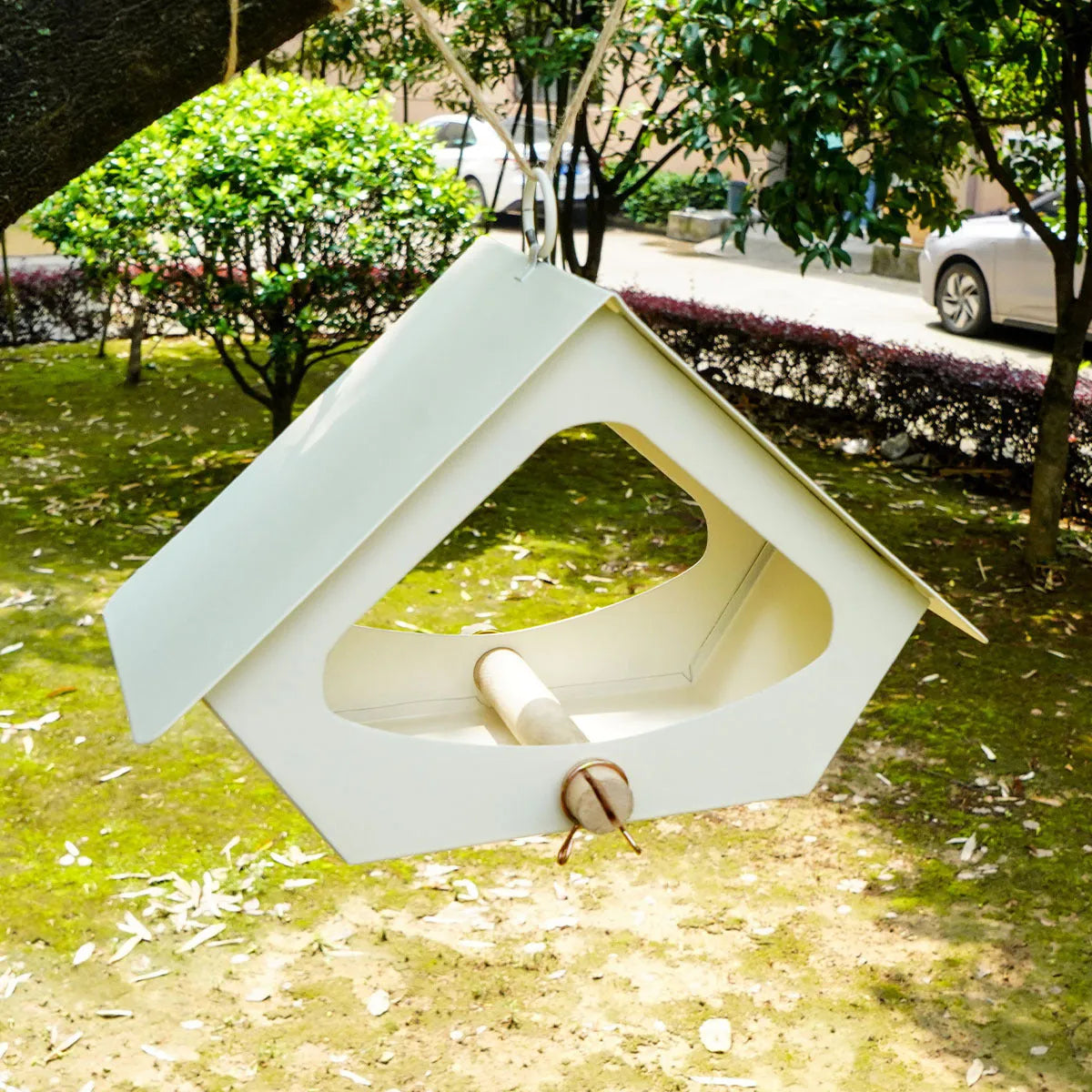 European-style iron bird nest feeder in garden setting with modern simple design