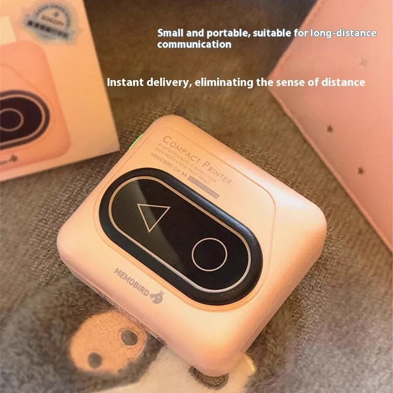Compact Avocado Green Bluetooth mini thermal printer with charging cable and paper roll on a white surface.