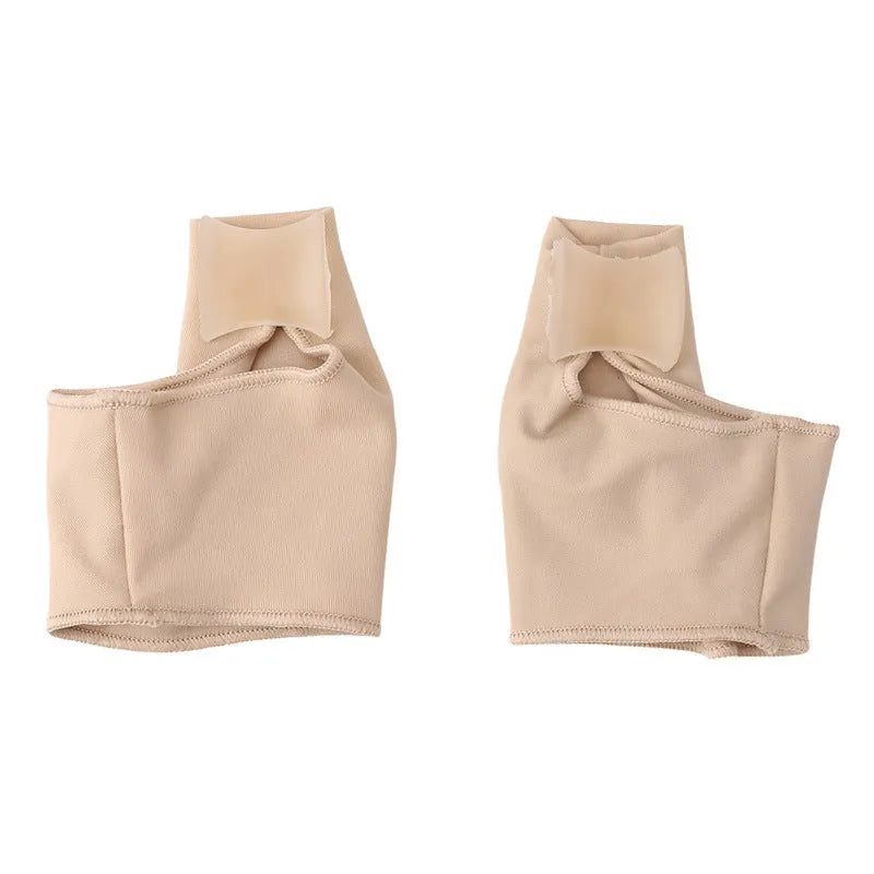 Pair of beige corrective toe socks with a clear silicone gel bunion pad and toe separator.
