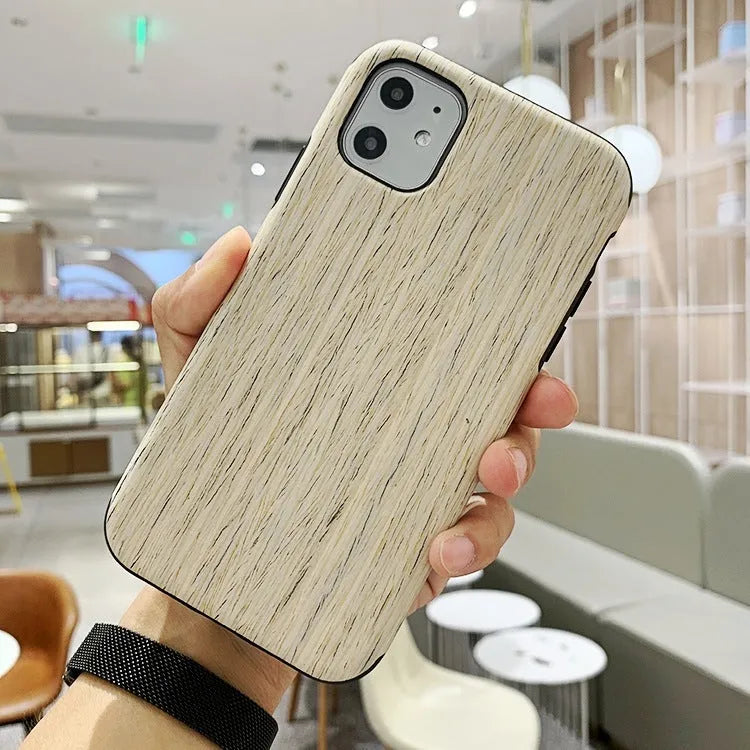 Natural wood iPhone back cover in Rosewood colour for iPhone 11 Pro, showing grain detail.