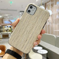 Natural wood iPhone back cover in Rosewood colour for iPhone 11 Pro, showing grain detail.