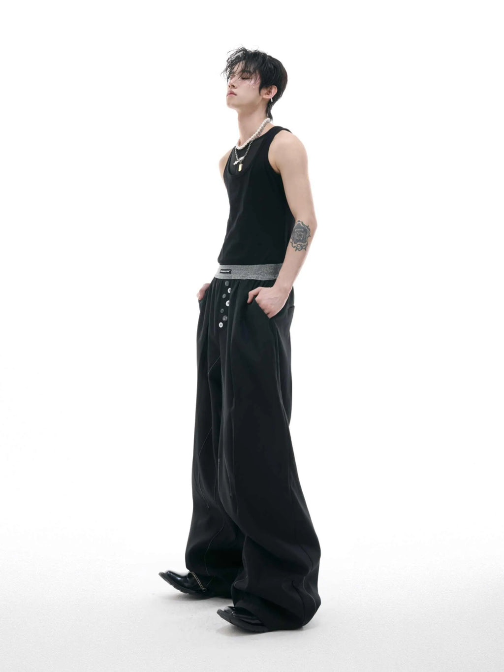 Drooping straight-leg suit pants with button open line design and high waist in black and grey colours