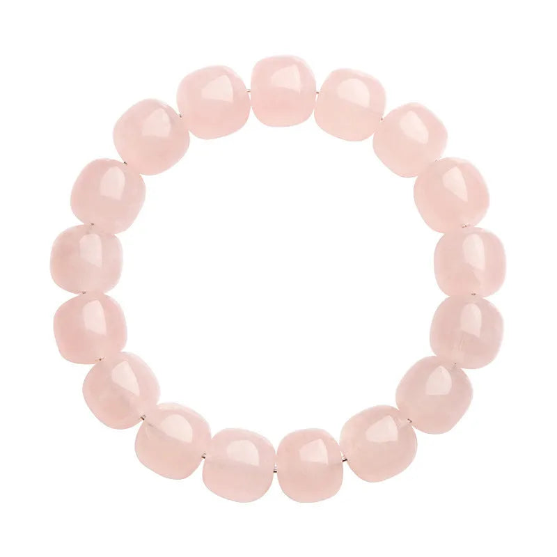 Natural bamboo crystal barrel bead bracelet with geometric pink beads measuring 11-12mm