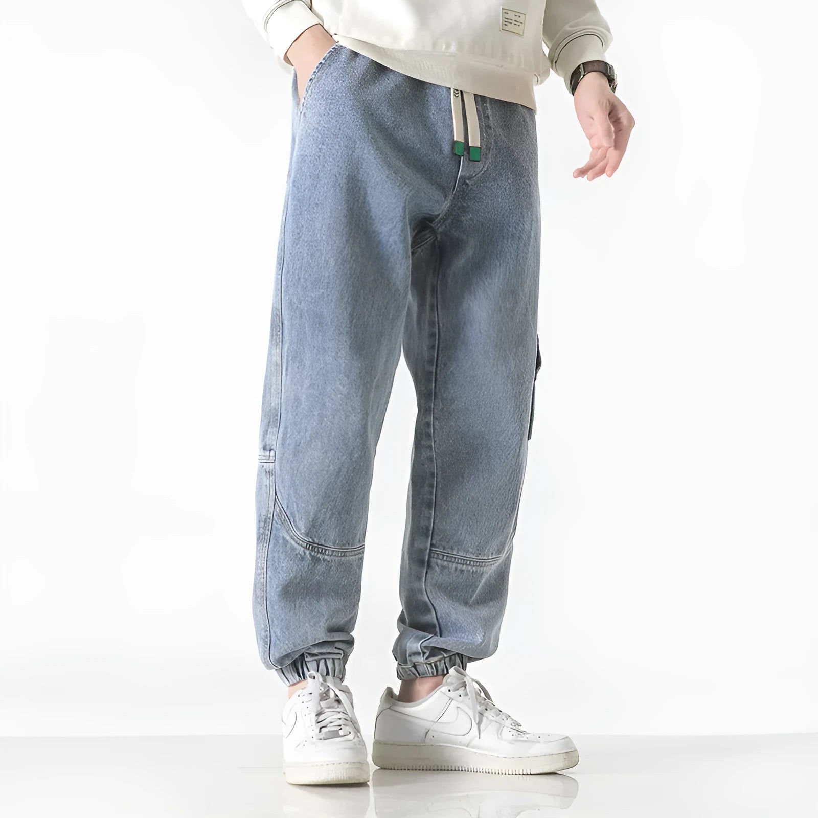 Men's loose-fit tapered cotton trousers in black, blue and grey colours