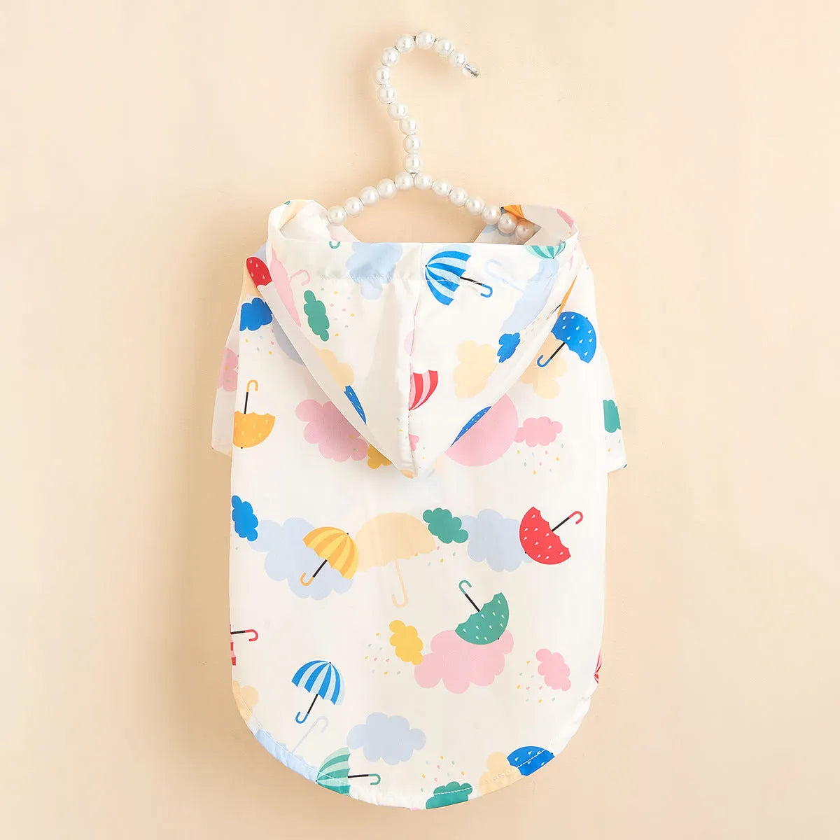 Colourful cartoon umbrella pattern dog raincoat in polyester available in sizes XS to XL