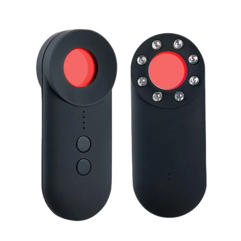 Black portable GPS and WiFi signal detector with laser scanner for hidden cameras on a table.
