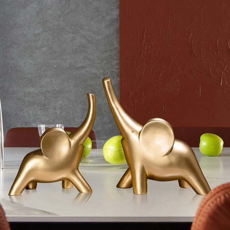 Modern rose gold and white resin elephant ornament figurine for home decor.