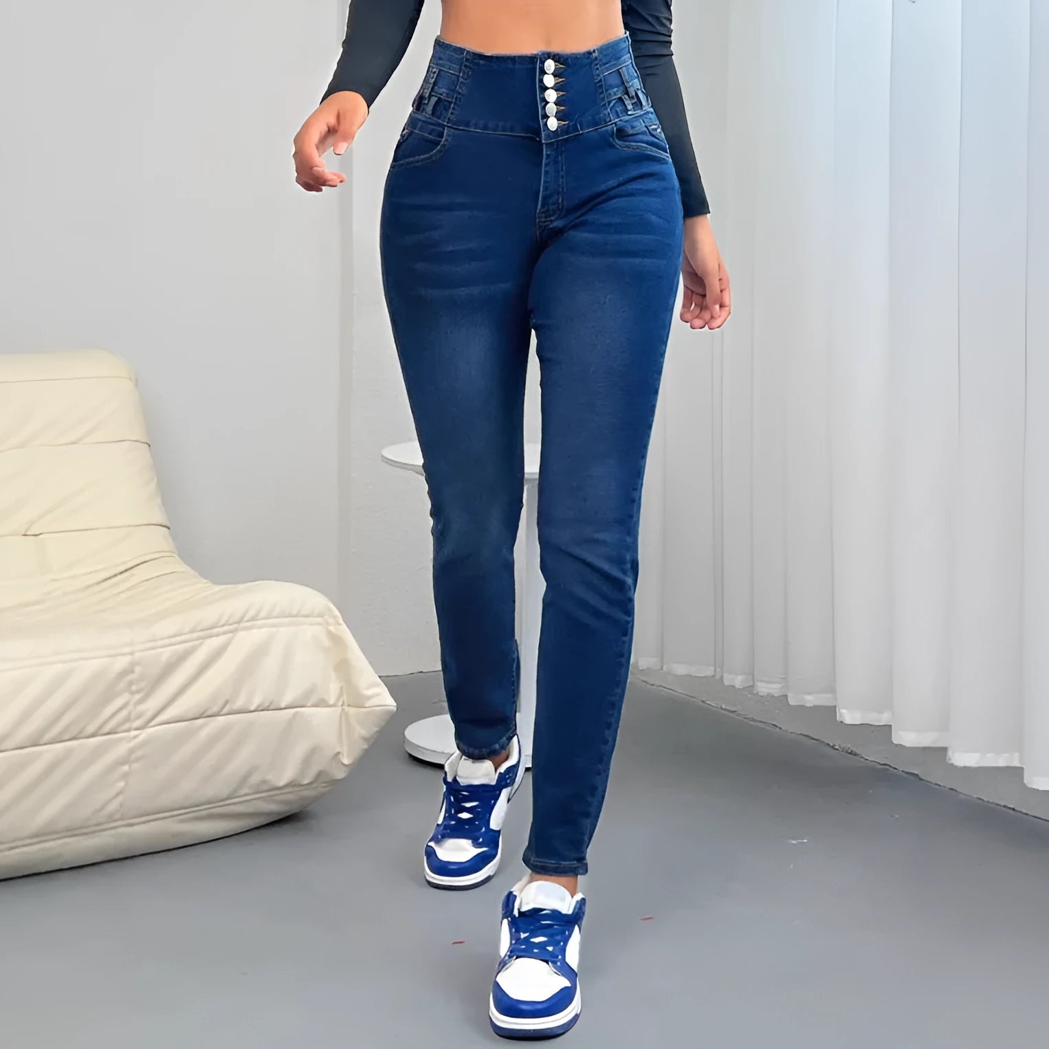 Dark blue women's denim trousers with breasted button front and straight leg cut