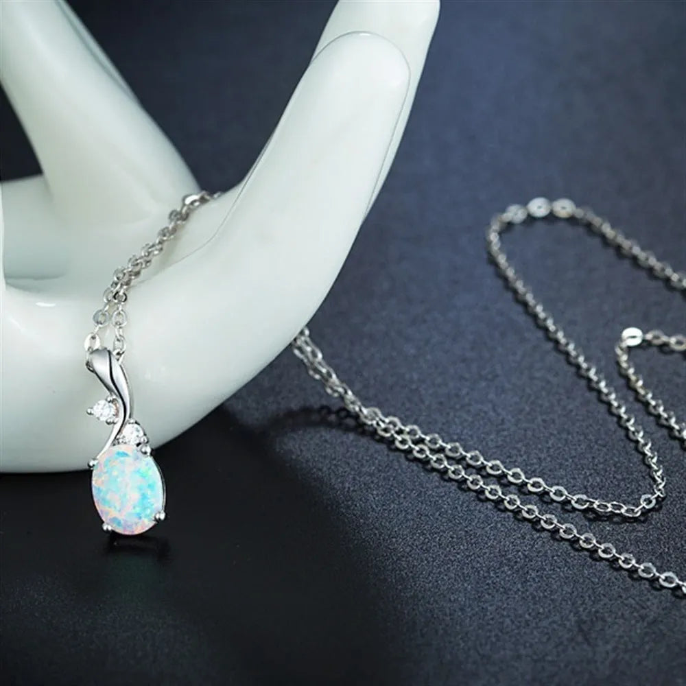Water drop shaped opal pendant necklace on O-chain with rose gold or white electroplated finish