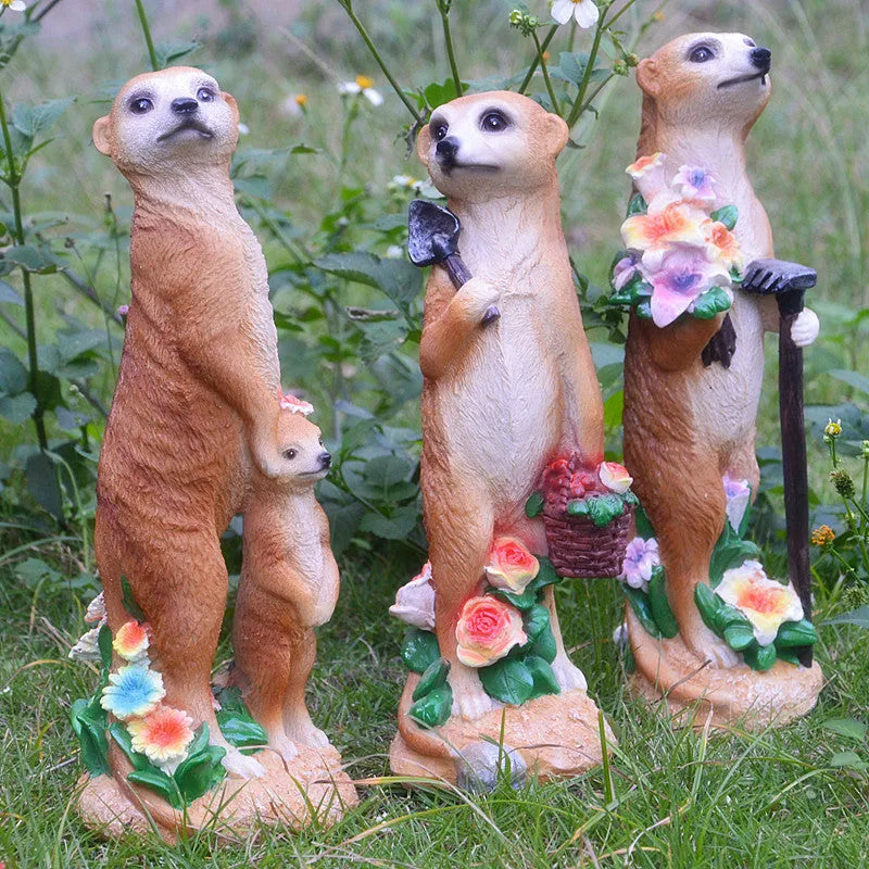 Yellow-brown resin mongoose garden ornaments with straw hats and gardening tools