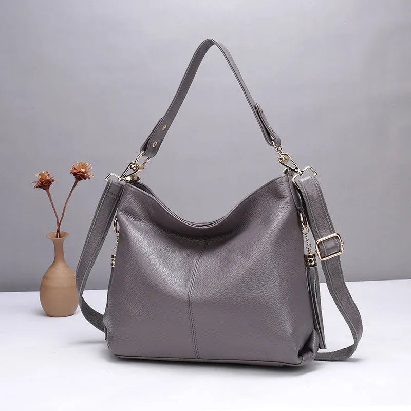Genuine leather crossbody bag in vertical square silhouette with internal organisation compartments