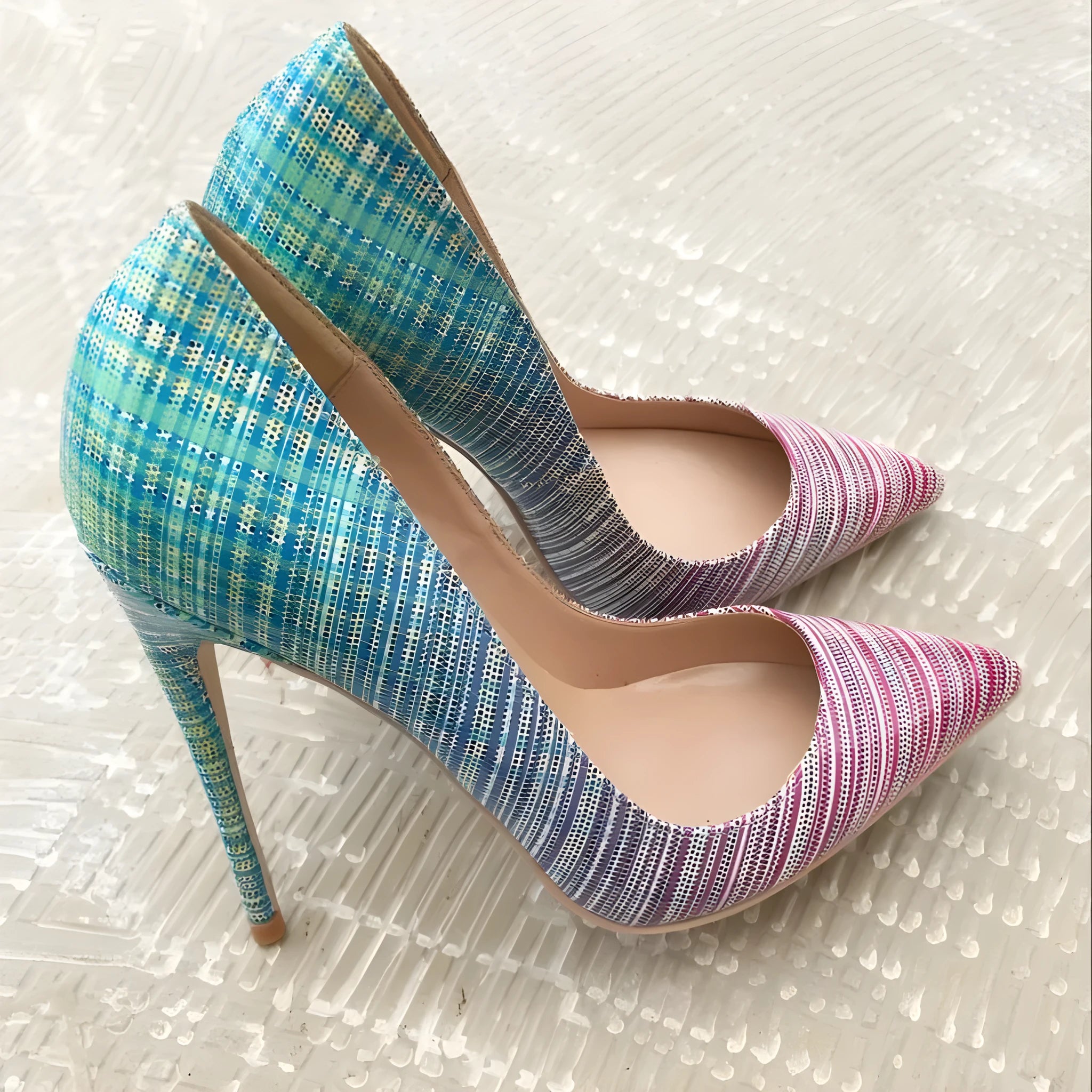 Ladies pink and blue gradient patent leather high heels with pointed toe.