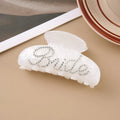 Pink and white acrylic shark clip hair barrettes with spot drill decoration on a sweet style