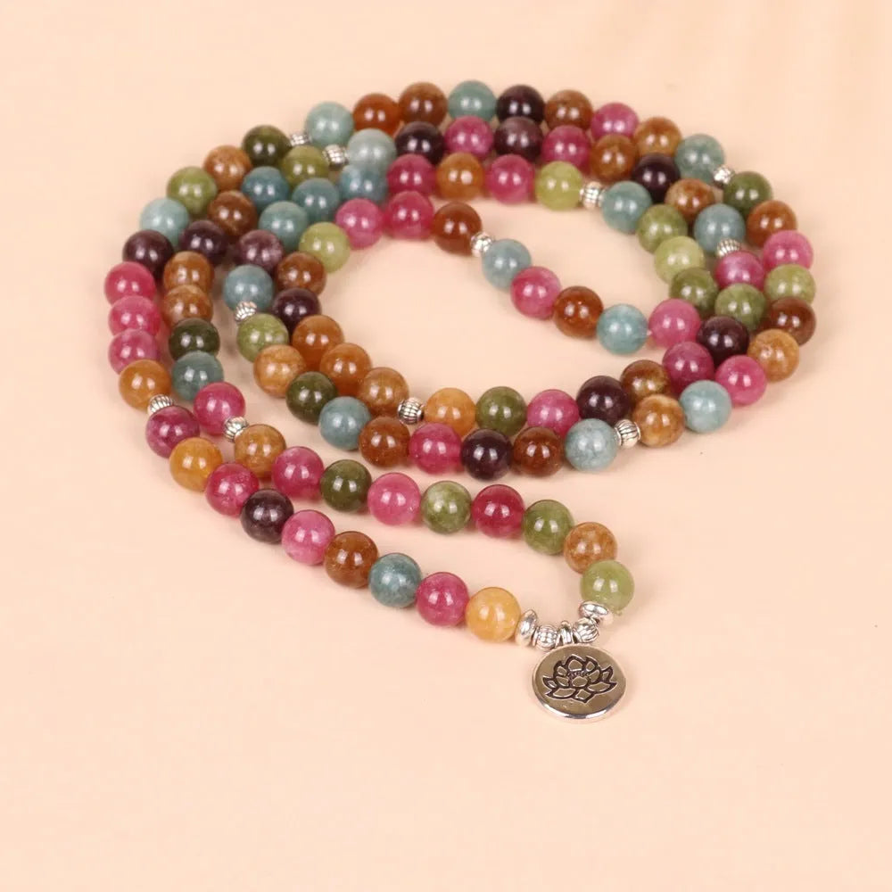108-bead alloy bracelet with a multi-layer lotus charm in a natural tourmaline colour.