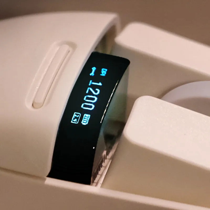 Xiaoqiao tofu-colour wireless mouse showing seven buttons and scroll wheel on desktop