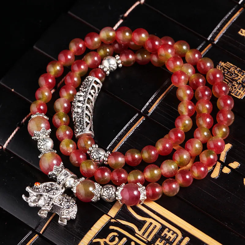 Natural watermelon crystal bracelet with Chinese knot and geometric beads in elephant style
