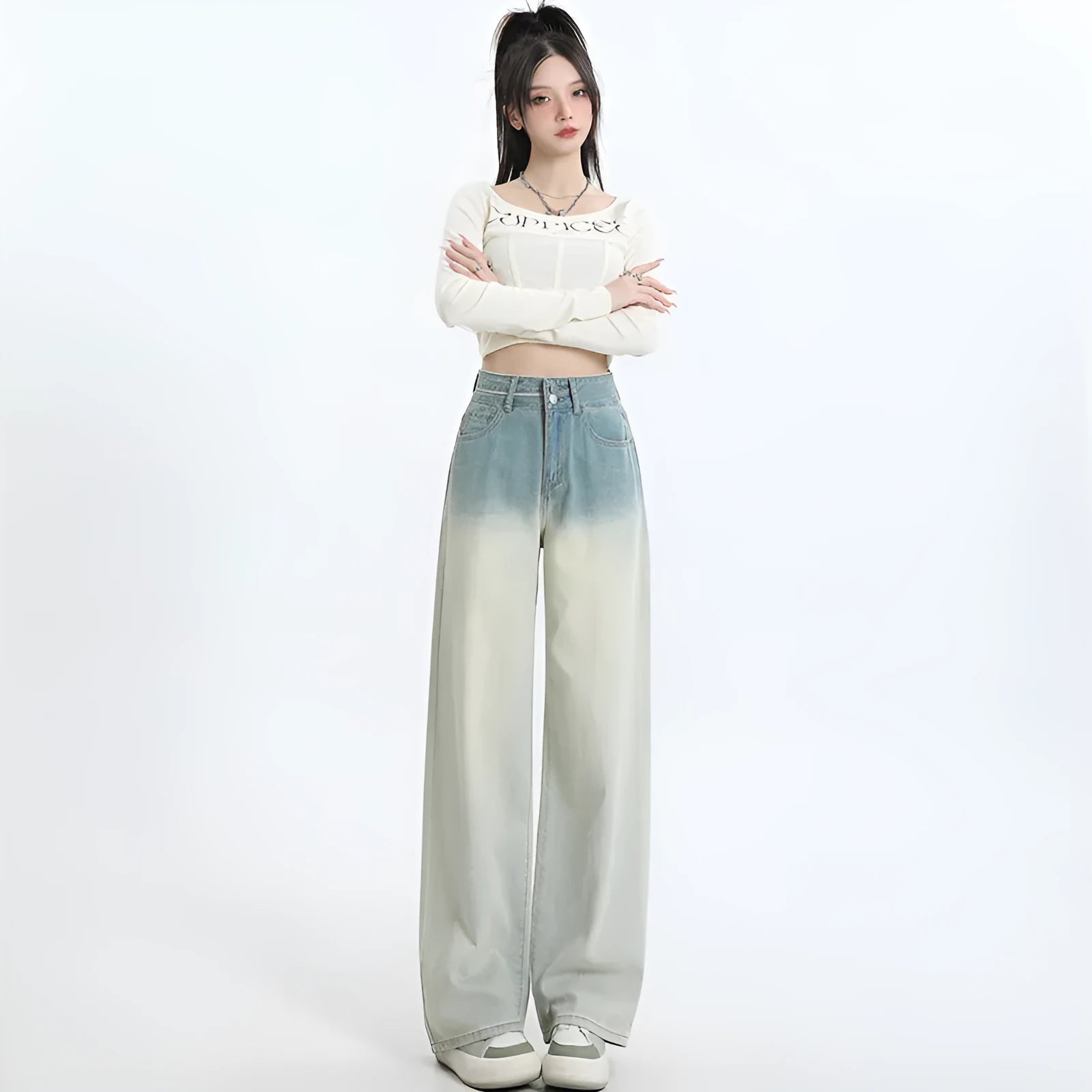 Women's gradient blue straight-leg denim trousers showing wide-leg design