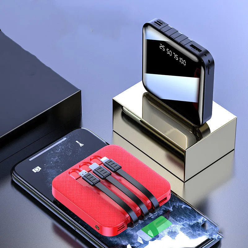 Black 10000mAh portable power bank with integrated charging cable, compact rectangular design.