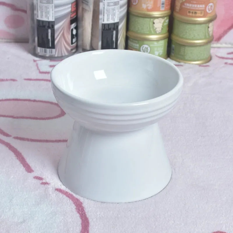 High-foot ceramic pet bowl with chin protector and anti-tumble base design