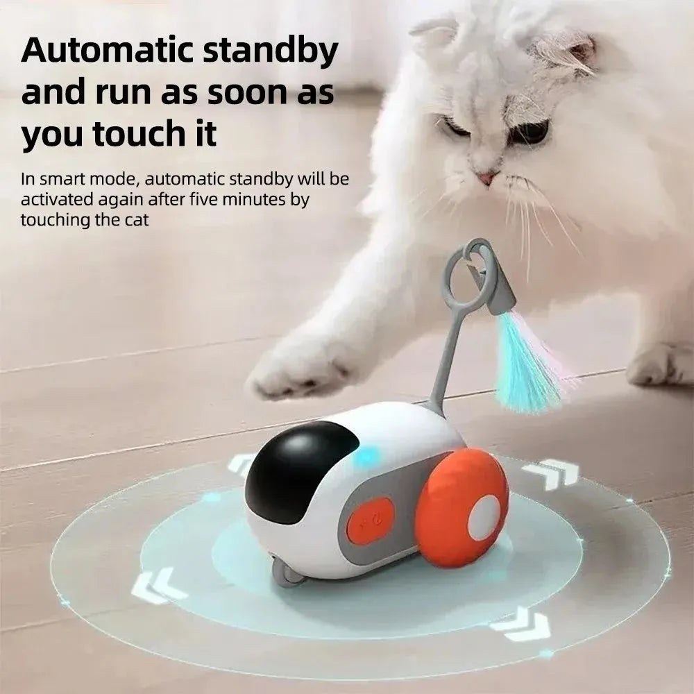 Blue remote-controlled smart cat toy car with feather teaser on a flat surface