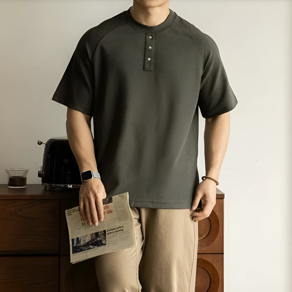 Women's loose-fitting casual pullover top with raglan sleeves in a terry texture fabric.