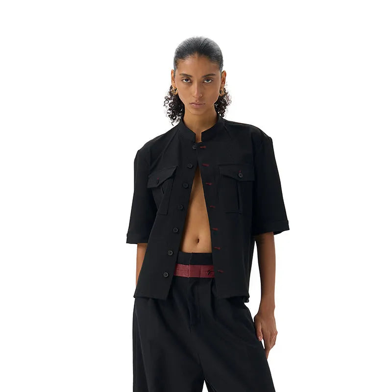 Black handmade red eye hunting shirt with half sleeves, shirt collar, and single-breasted placket.