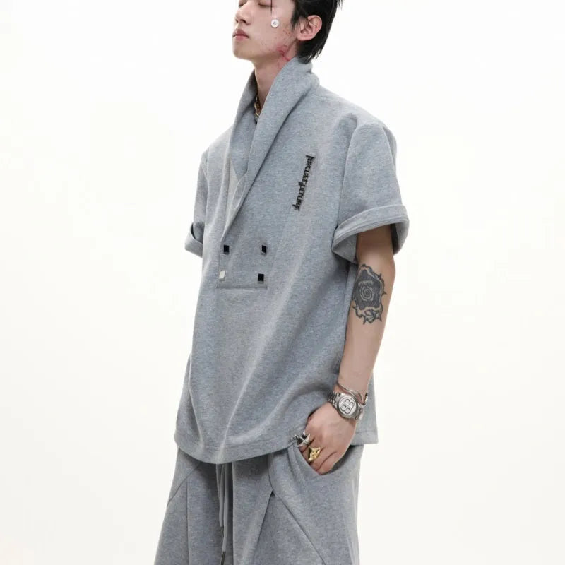 Men's two-piece metal embellished cotton sports suit with padded shoulders and matching shorts
